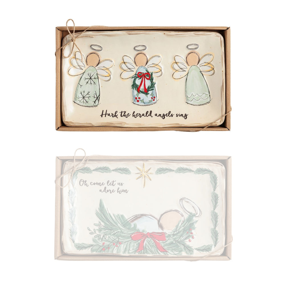 Set of angel-themed trays in a decorative box on a white background