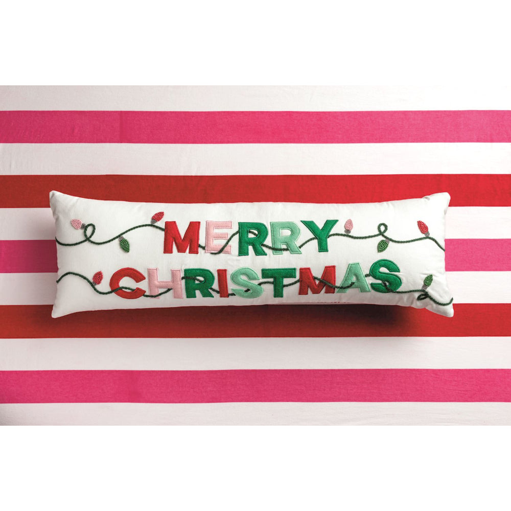 Decorative pillow with 'Merry Christmas' text on a red and white striped background