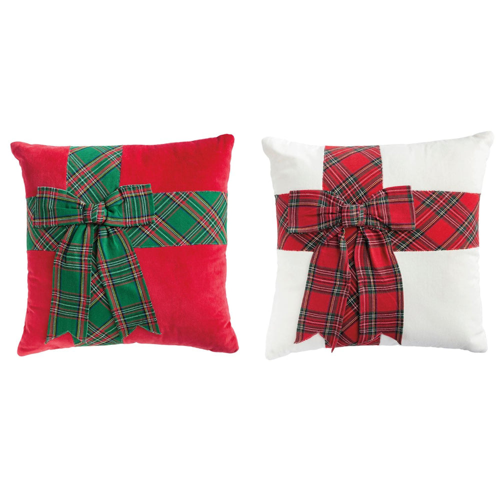 Two decorative pillows with plaid bows on a white background