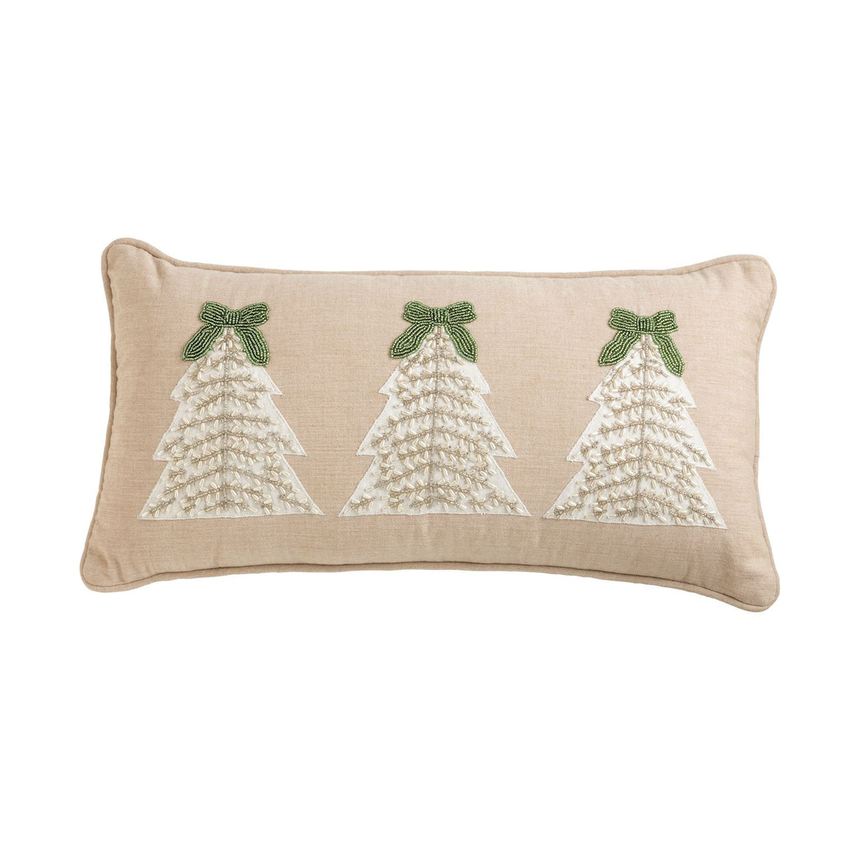 A rectangular beige throw pillow featuring three embroidered white Christmas trees with green bows, set against a plain white background.