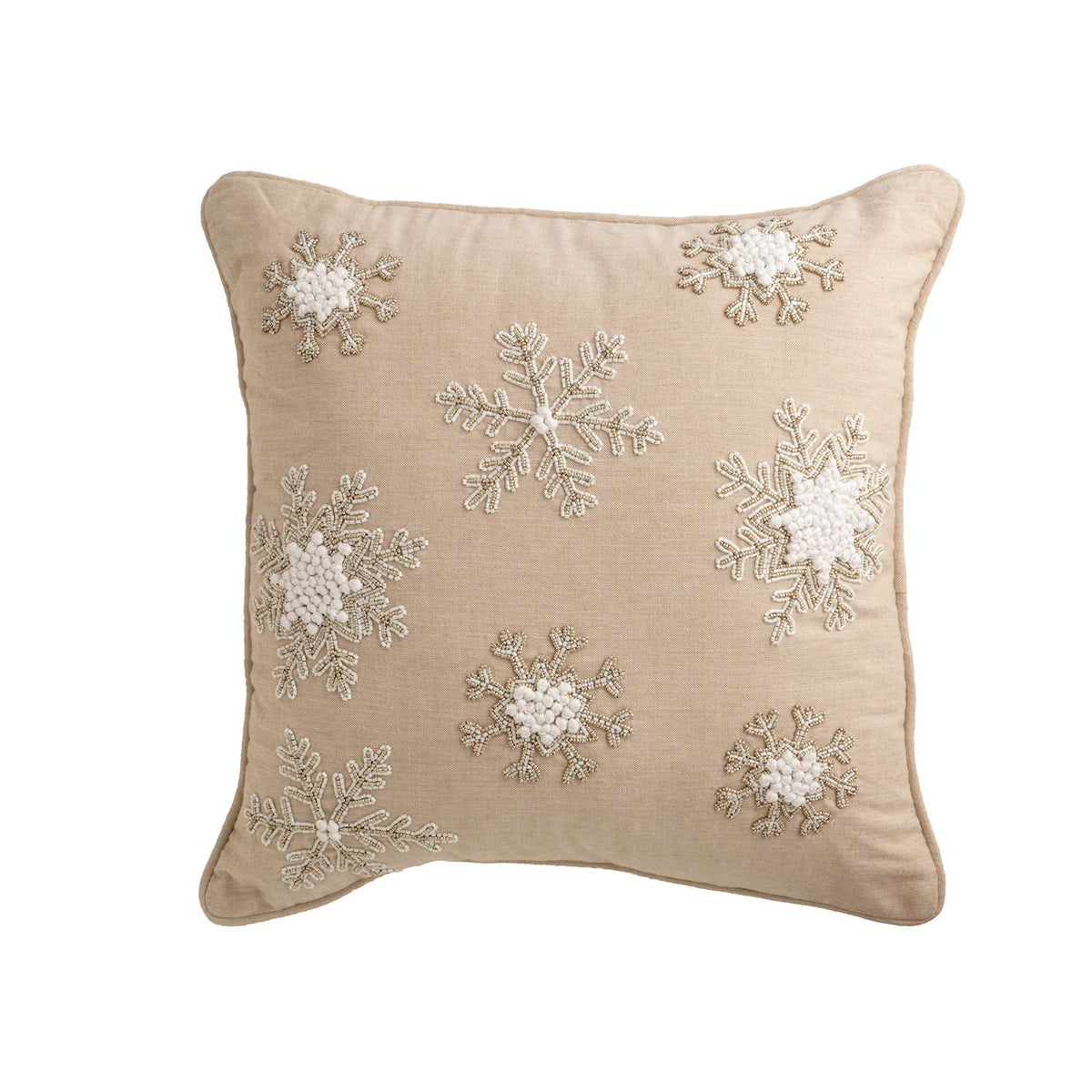 Beige pillow with snowflake embroidery on a white background