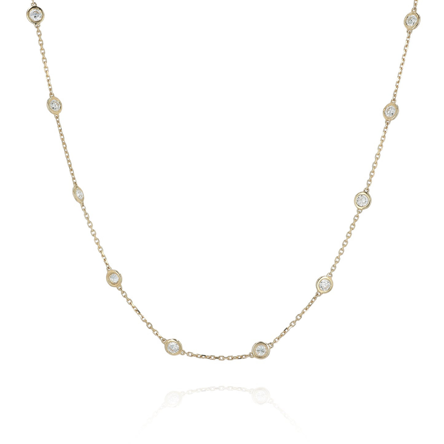 Yellow gold Diamonds By The Yard diamond station necklace on a white background