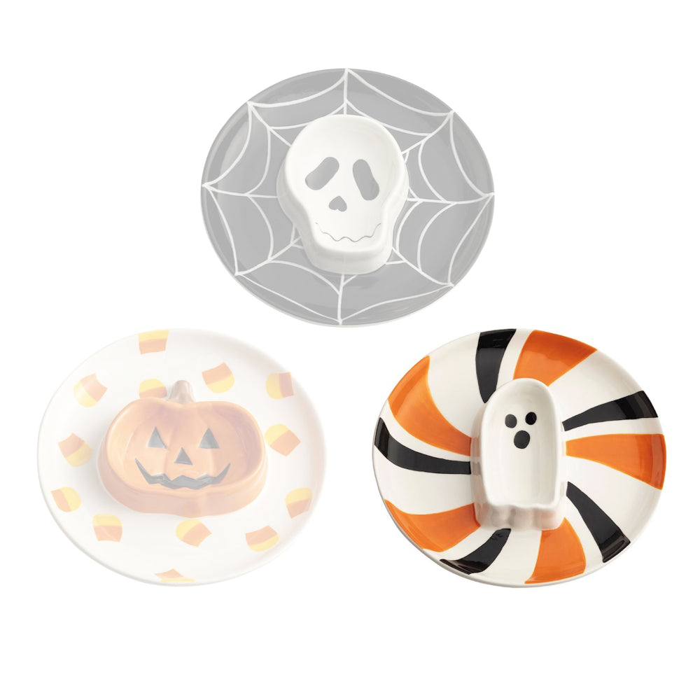 Three Halloween-themed ceramic plates with skull, pumpkin, and ghost designs on a white background.