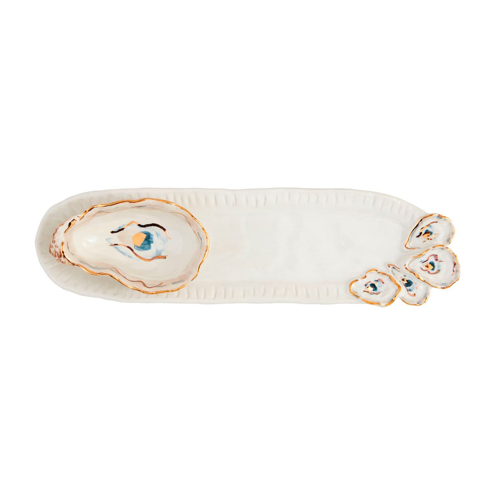 Decorative plate with oyster shells on a white background.