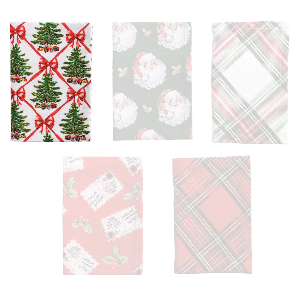 holiday-themed Christmas tree towel with red bows on a white backround. 