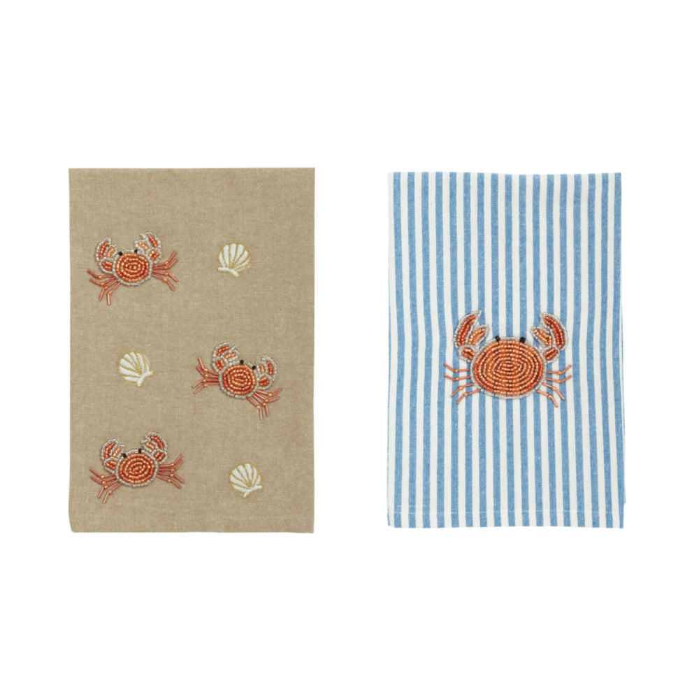 Two Tan and blue & white vertical stripes towels with red crab and sea designs on a white background.