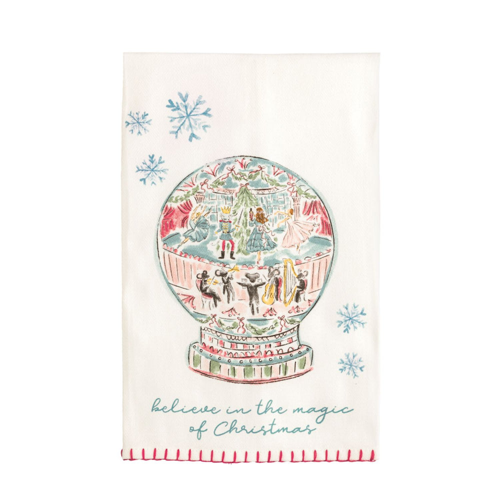 Decorative towel with a Christmas-themed snow globe design and text on a white background