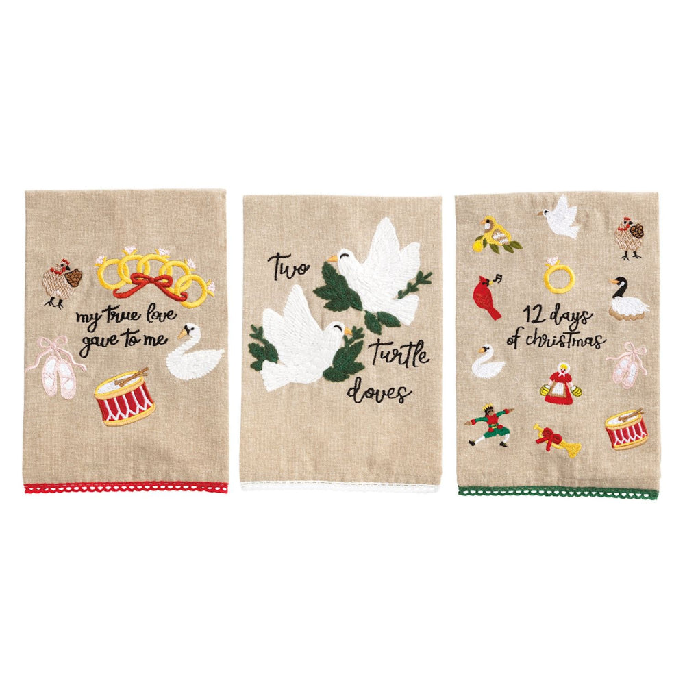 Three decorative towels with Christmas-themed designs on a white background