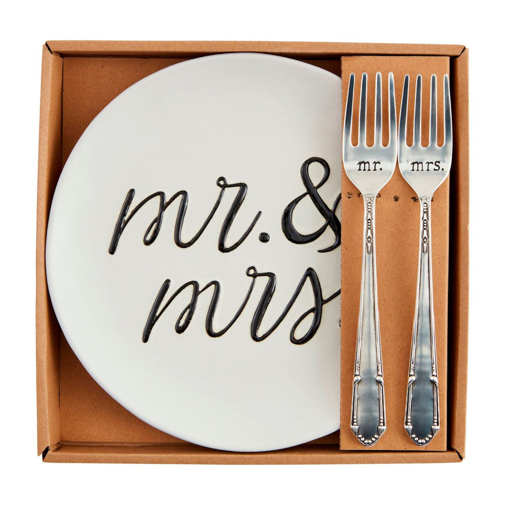 Set of 'mr. & mrs.' plate and forks in a box on a white backround.
