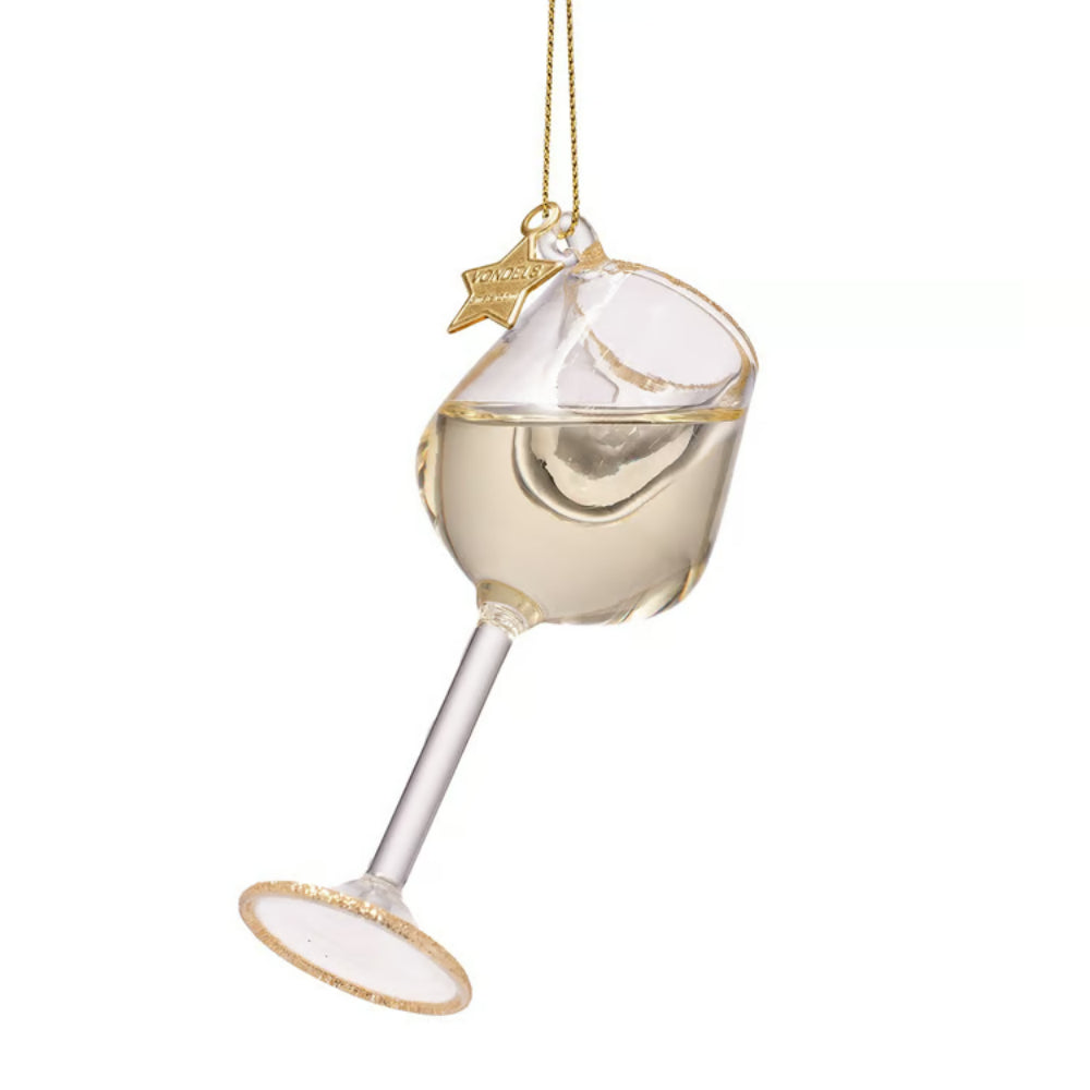 A wine glass-shaped hanging ornament filled with pale gold liquid, featuring a gold hanging string and a small gold star charm.