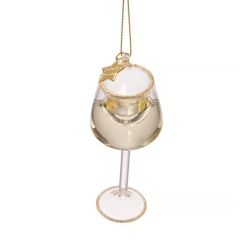 A clear glass wine glass ornament decorated with gold trim and a gold hanging chain with a small star charm.