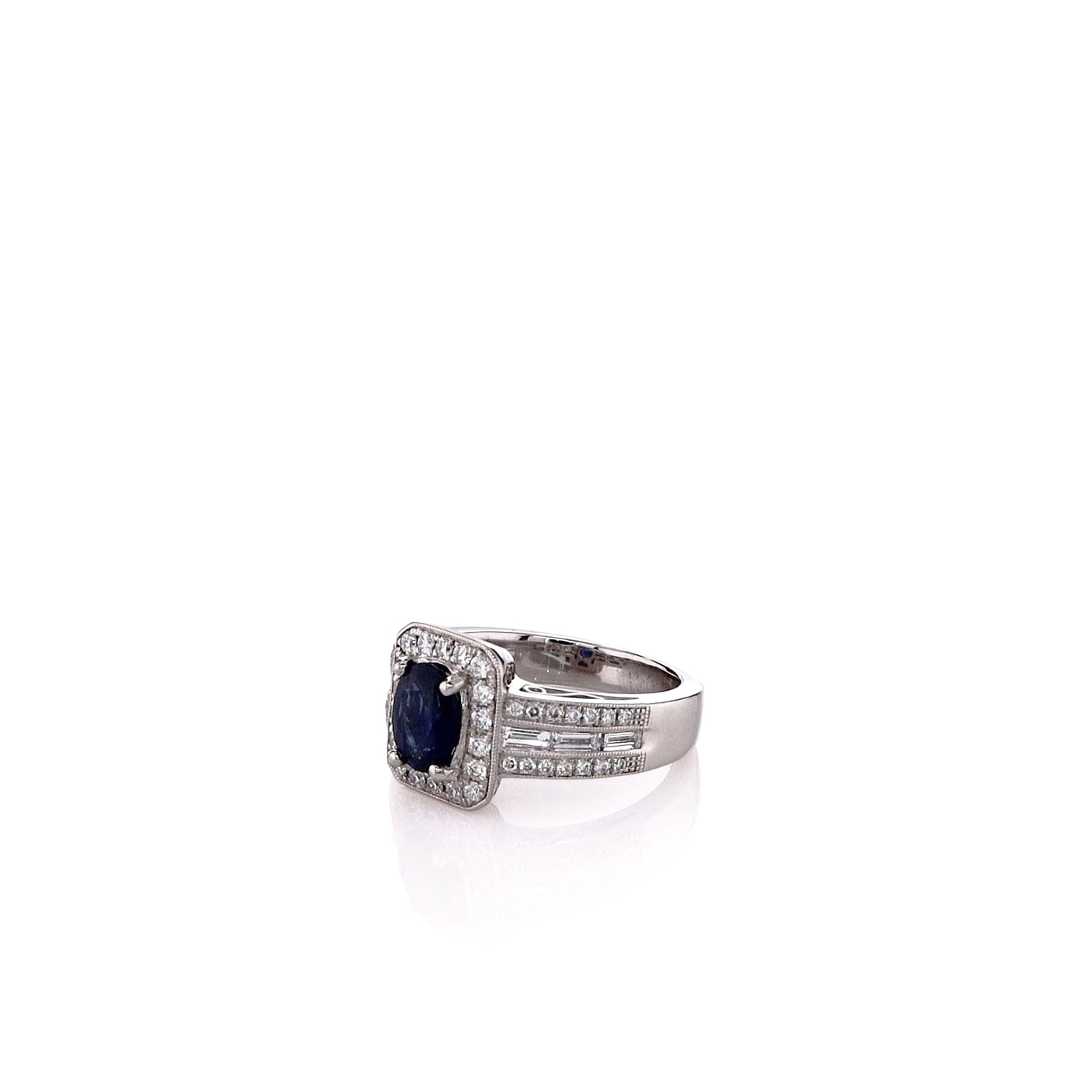 Estate Simon G. Platinum Sapphire and Diamond Triple Shank Halo Ring
