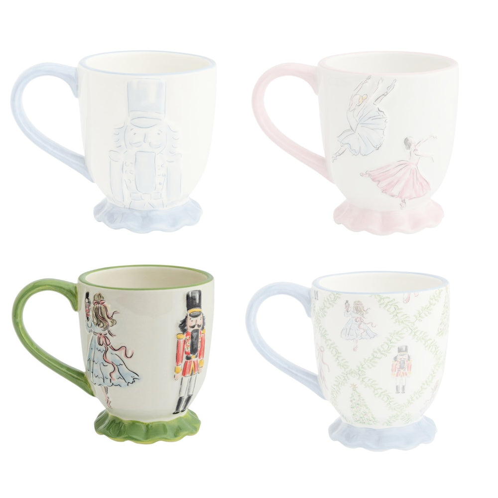 Four decorative mugs with fairy tale designs on a white background