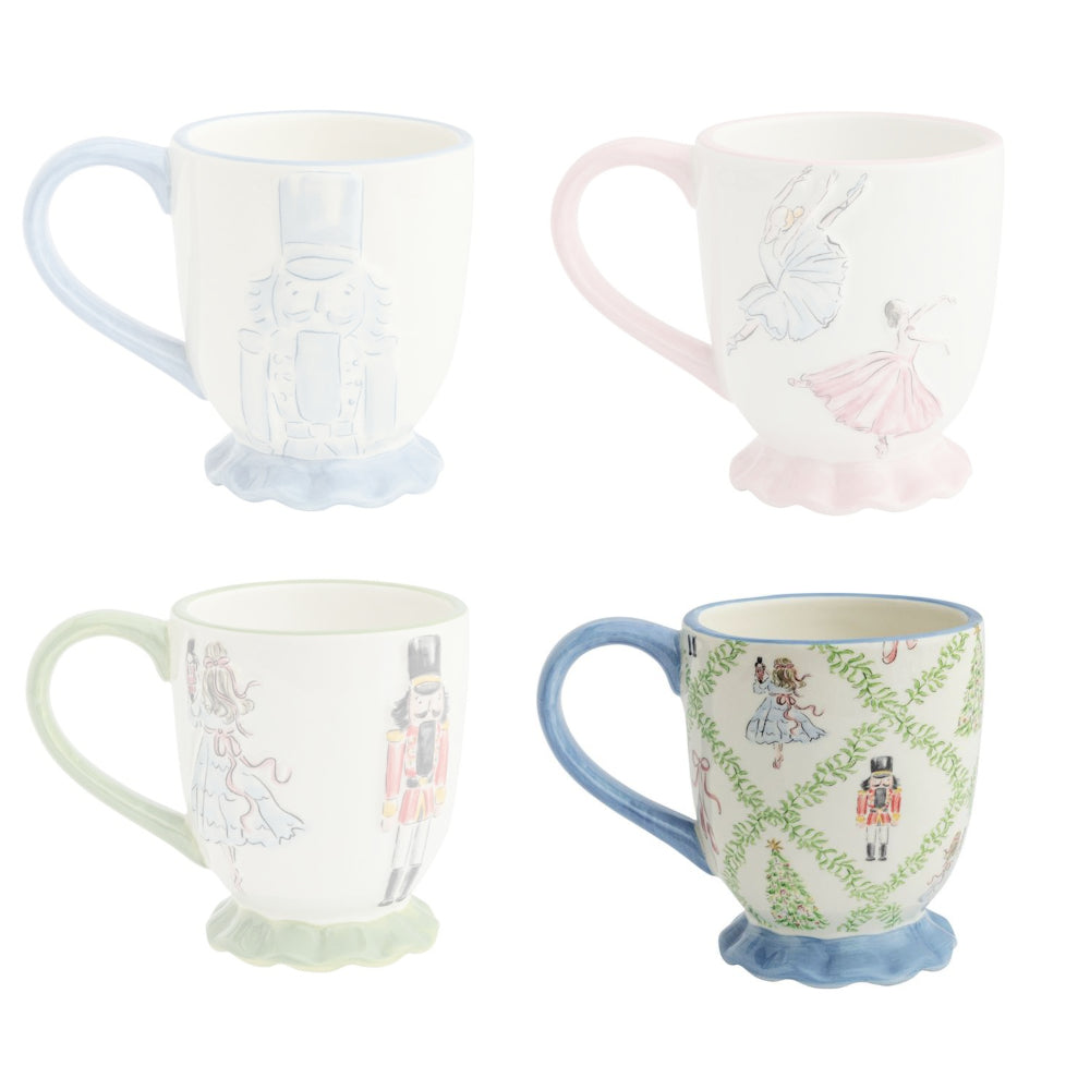 Four decorative mugs with fairy and prince designs on a white background