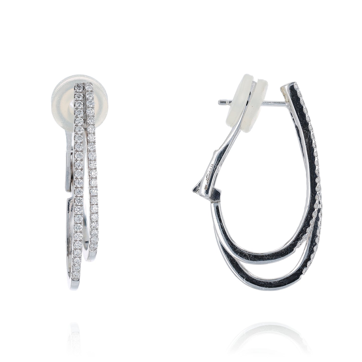 Pair of white gold 2 row diamond hoop earrings on a white background