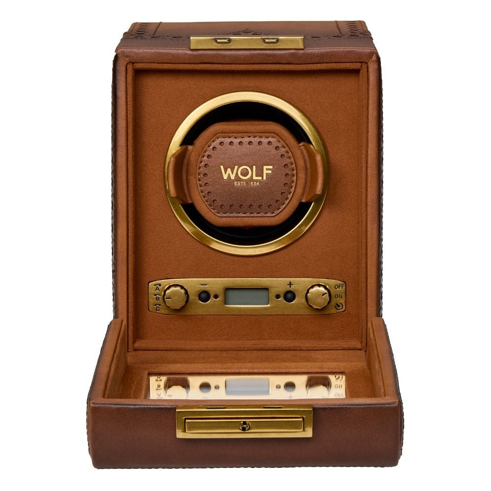 Brown and gold watch winder with 'WOLF' branding on a white background