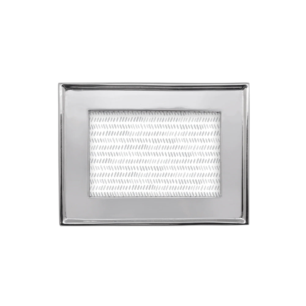 4x6 metallic silver frame on a white background.
