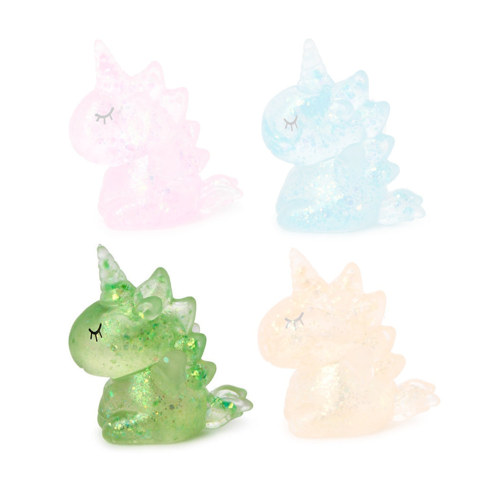Green squishy glittery unicorn toy on a white background