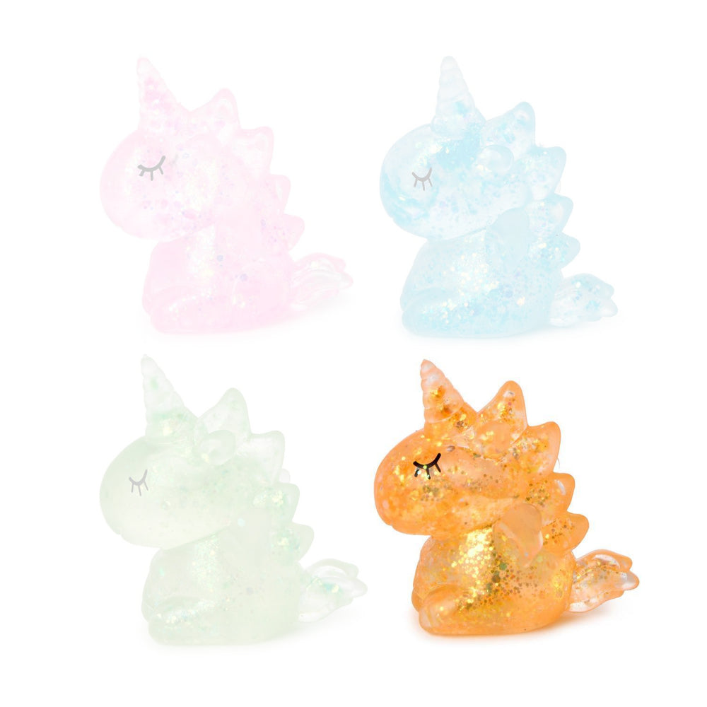 Orange squishy glittery unicorn toy on a white background