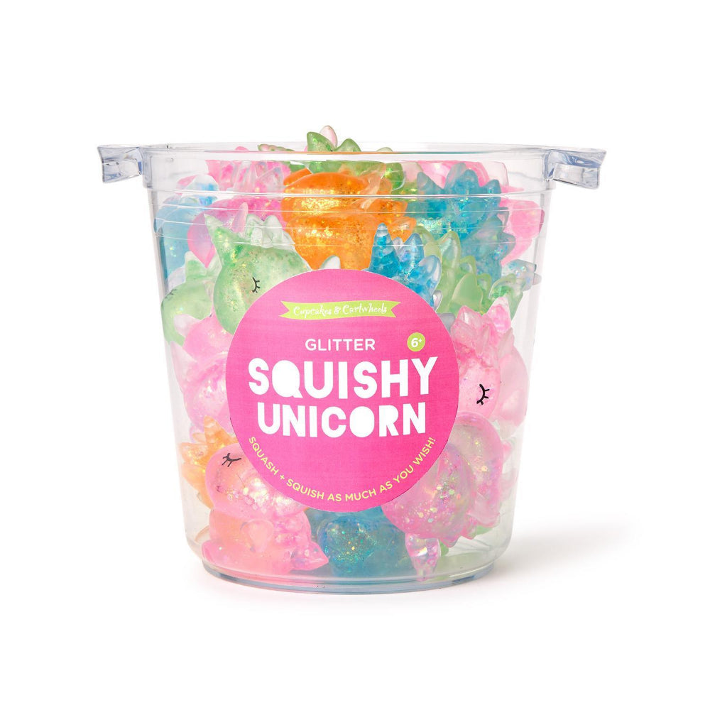Clear container filled with colorful squishy unicorns and a pink label on a white background