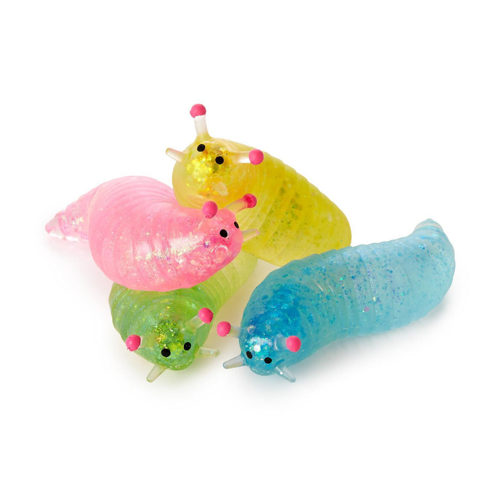 Four colorful blue, pink, yellow & green squishy glitter slug toy on a white background