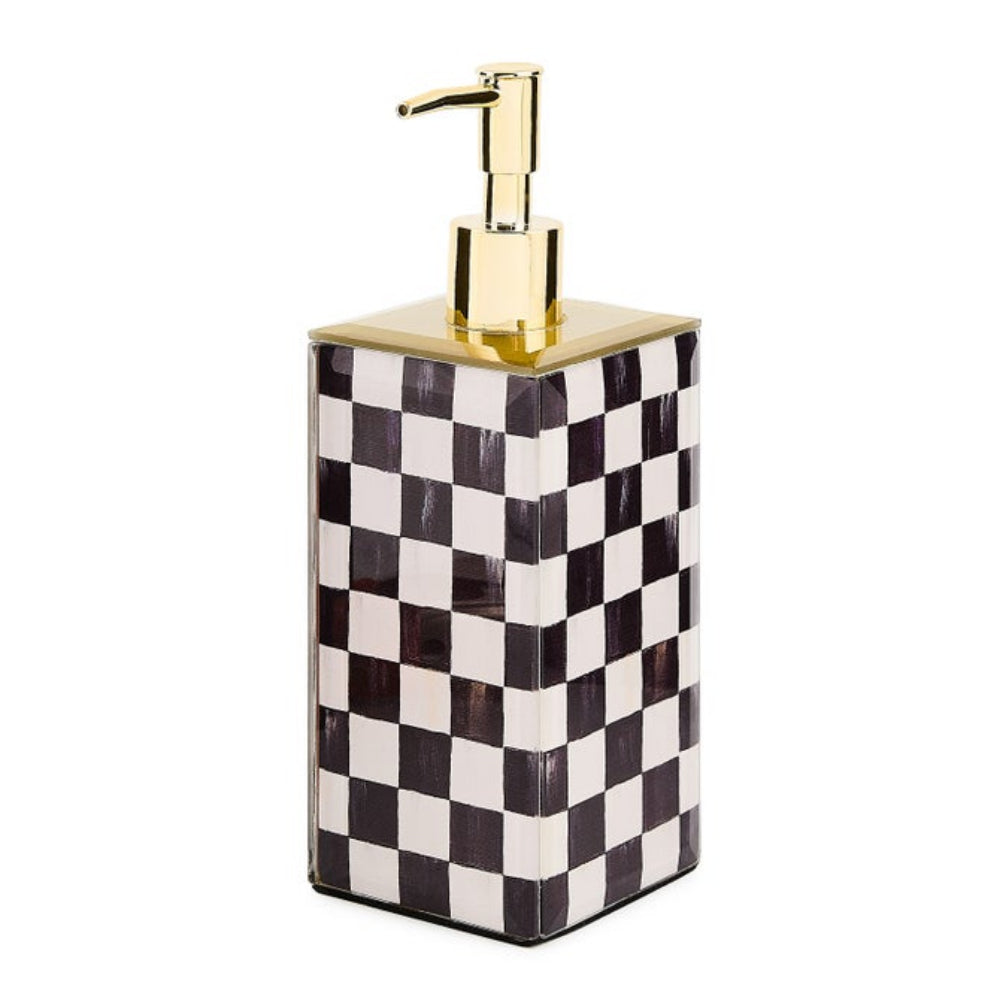 Checkered soap dispenser with gold pump on a white background