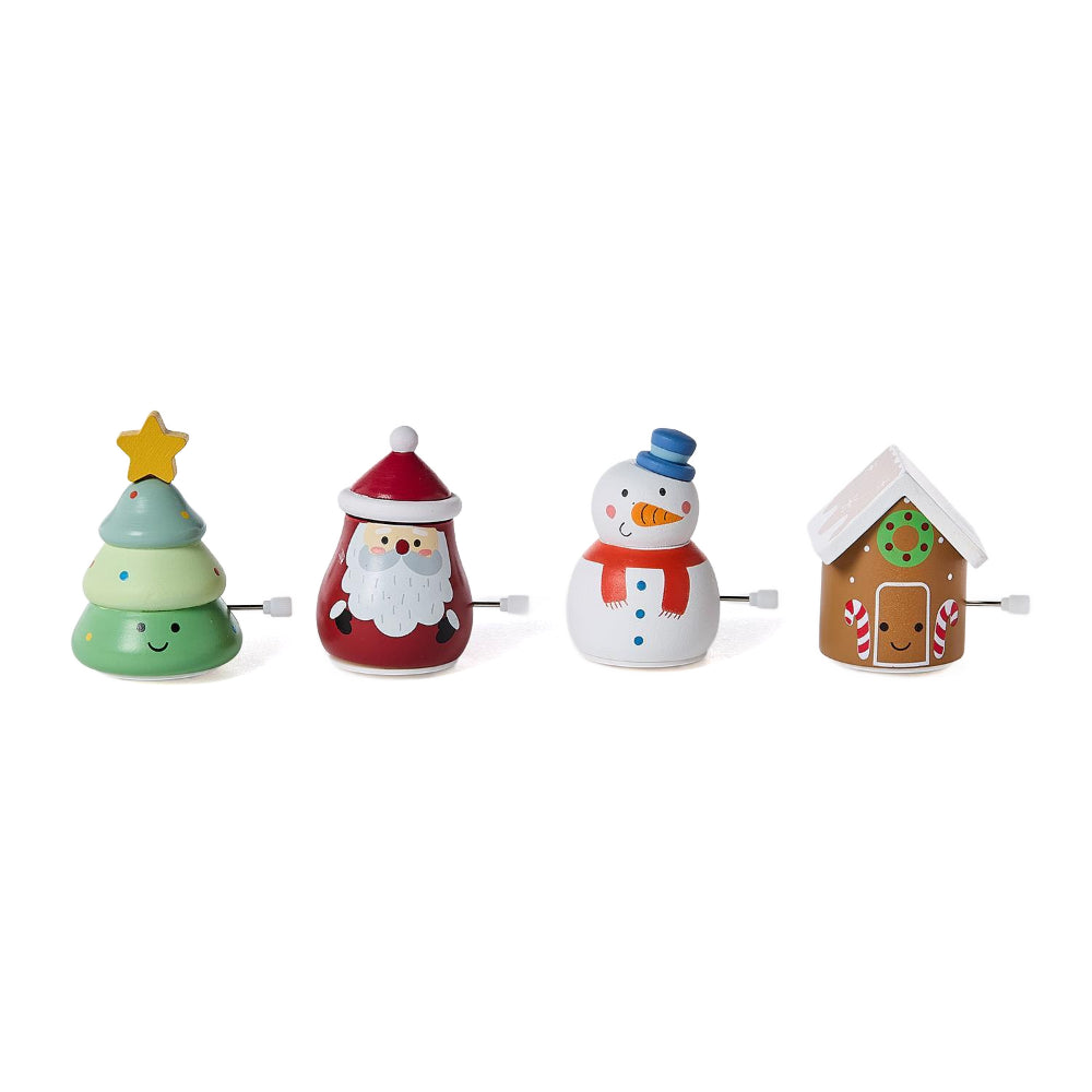 Four Christmas-themed figurines on a white background.