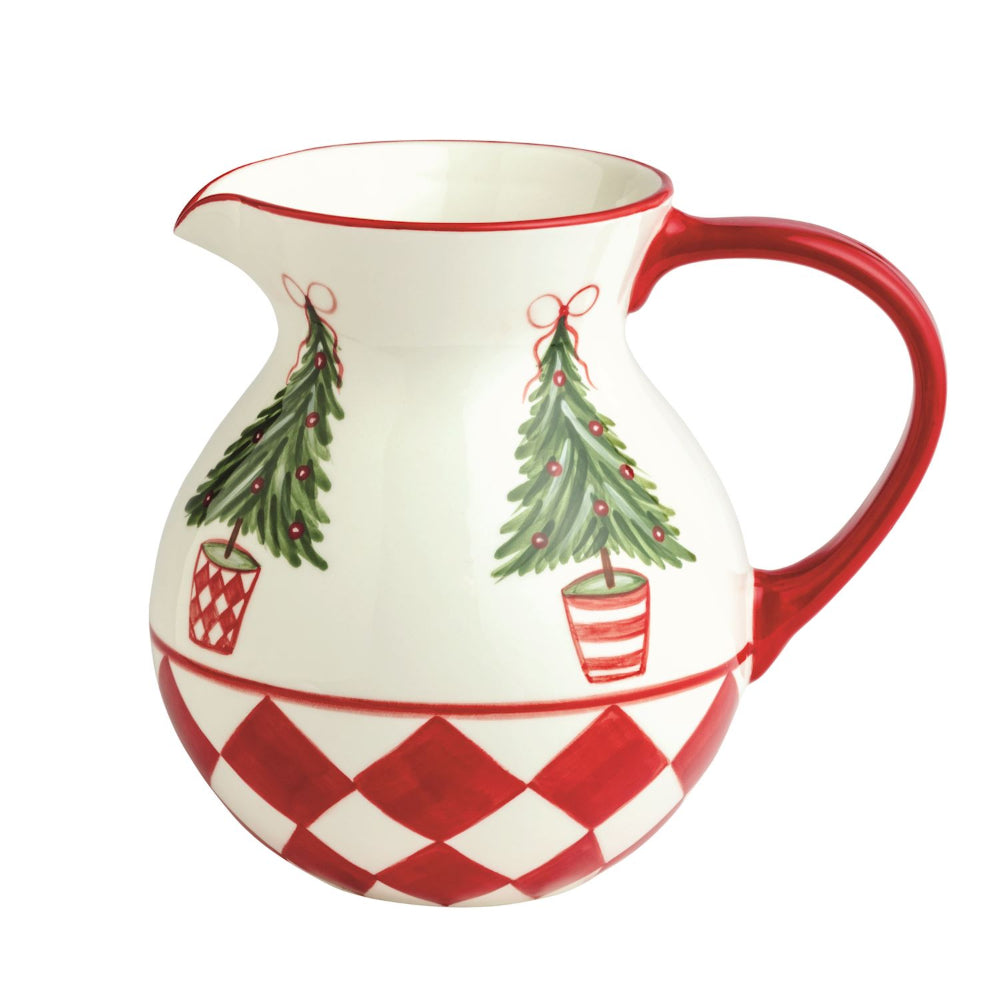 Ceramic pitcher with Christmas tree design on a white background
