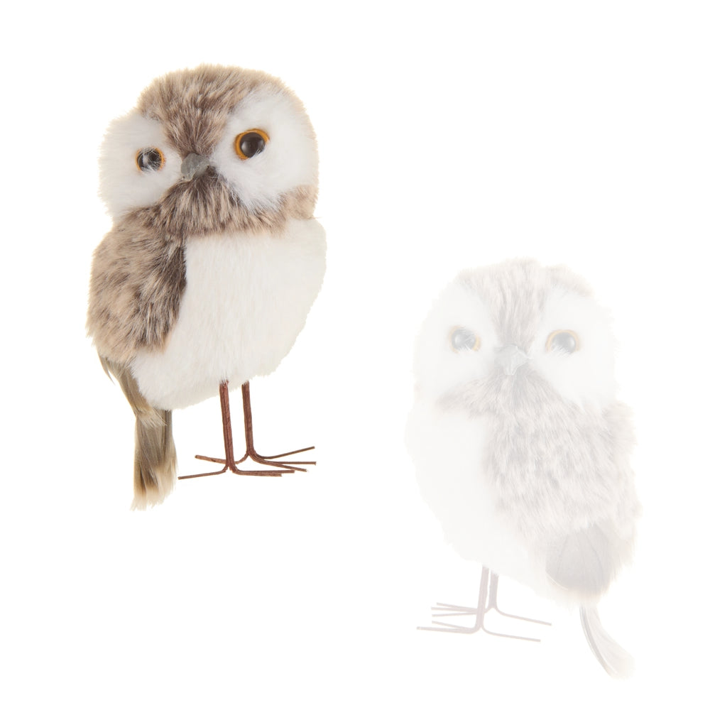 A plush owl toy shown on a white background, with a faded duplicate image to the right suggesting motion or multiple positions.