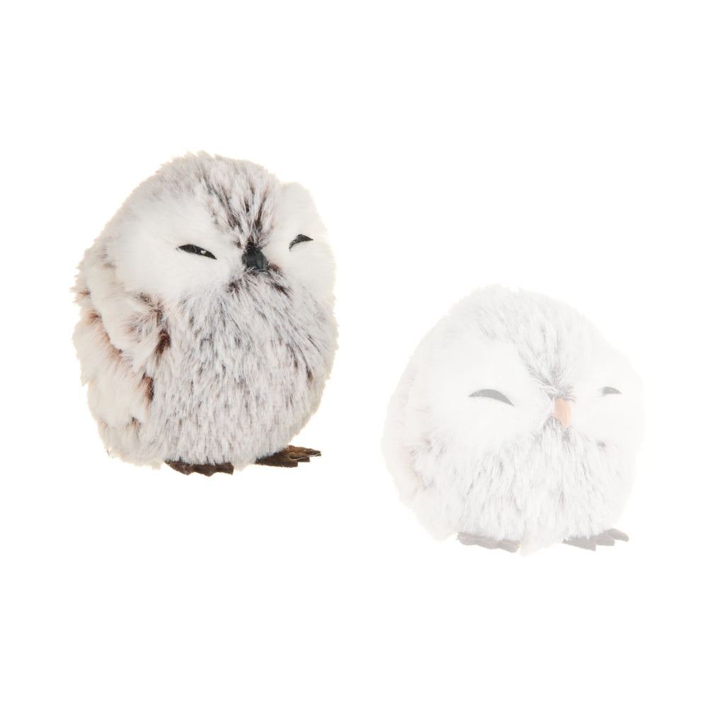 Black Beak owl figurine on a white background.