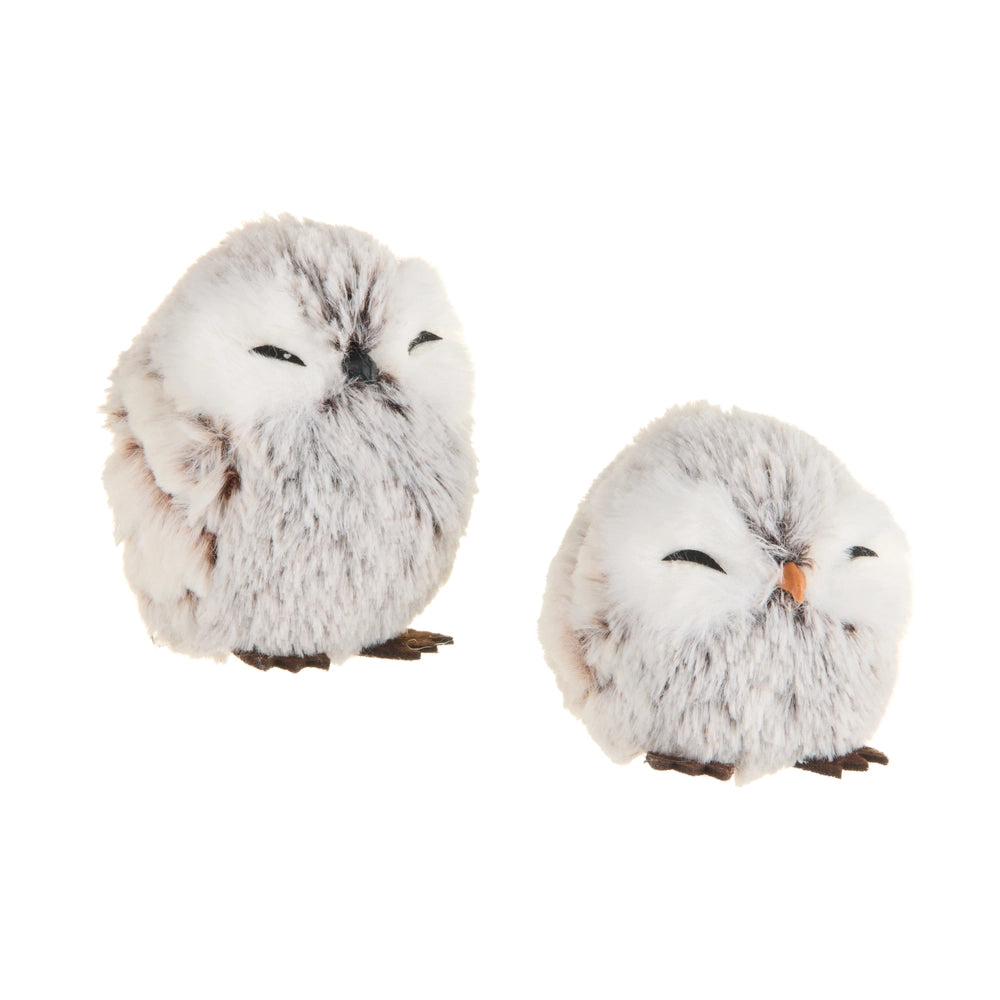 Two fluffy owl figurines on a white background.