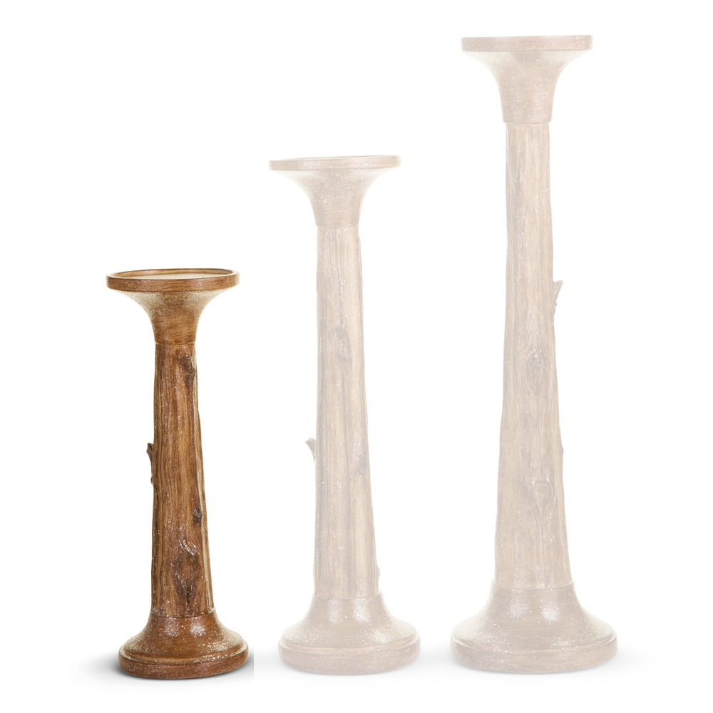 Small decorative Tree Trunk Candle Holder on a white backround. 