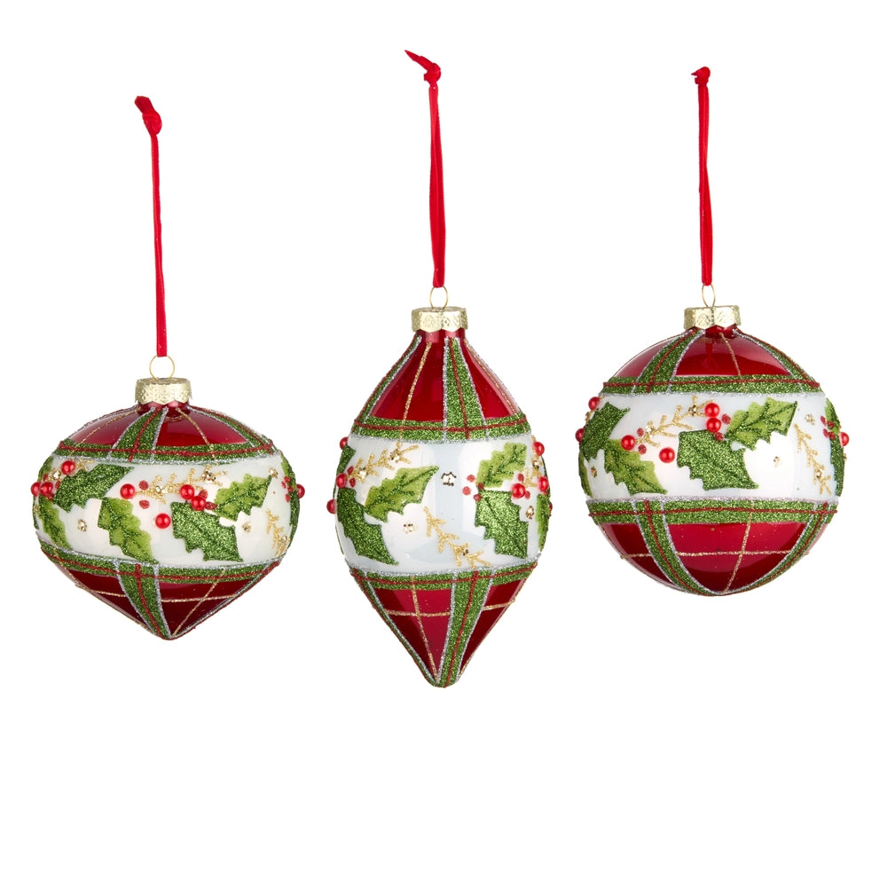 Three Christmas tree ornaments with holly design on a white background