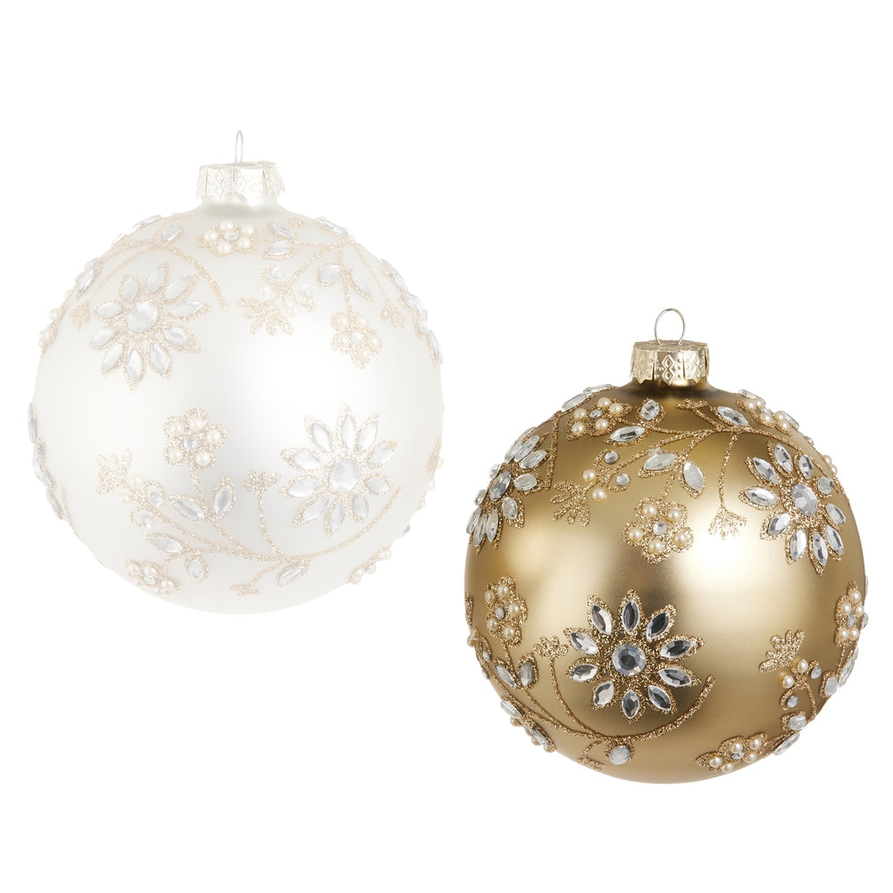 Gold Christmas ornament  gold with floral patterns, on a white background.