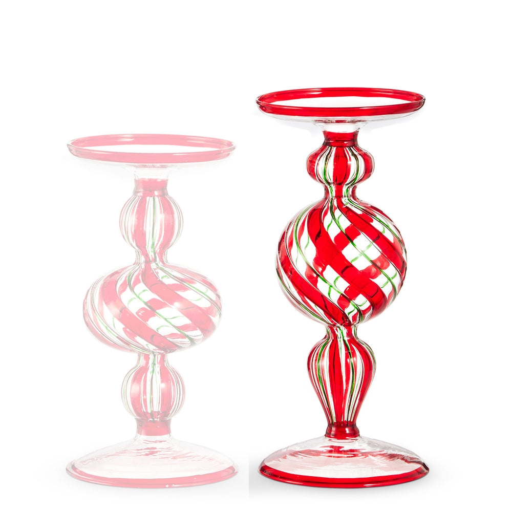  9" red and white striped  glass candle  on a white background.