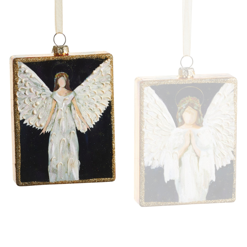 Two angel ornaments with wings on a white background