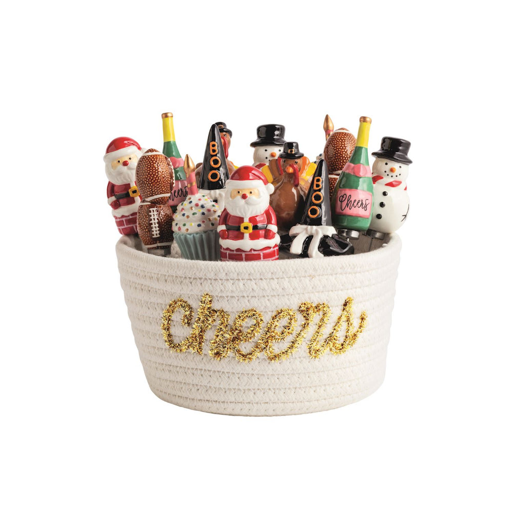 Decorative basket with Christmas-themed spreaders and 'Cheers' text on a white background.