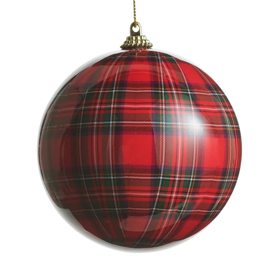 Red and black plaid Christmas ornament on a white background