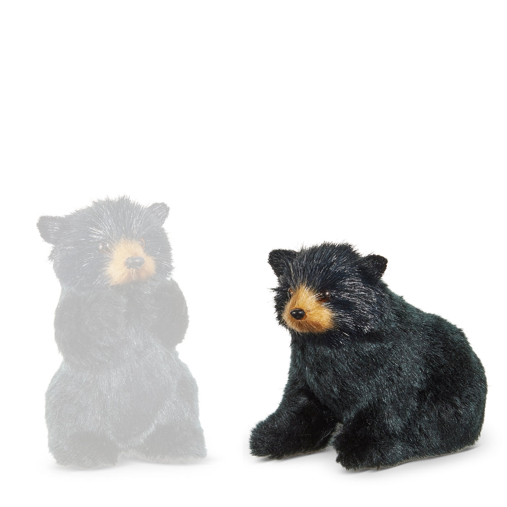 Sitting  bear ornament on a white backround. 