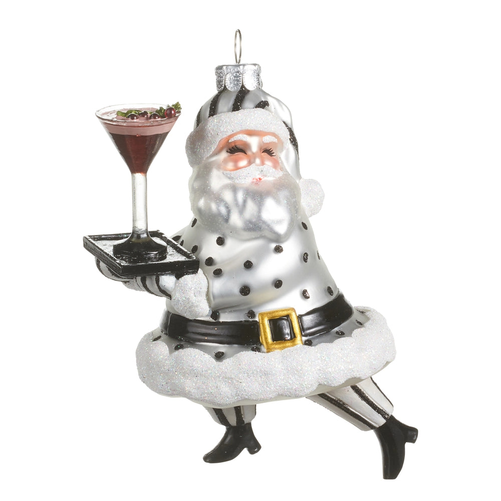 Decorative ornament of a modern Santa Claus holding a cocktail and tray on a white background
