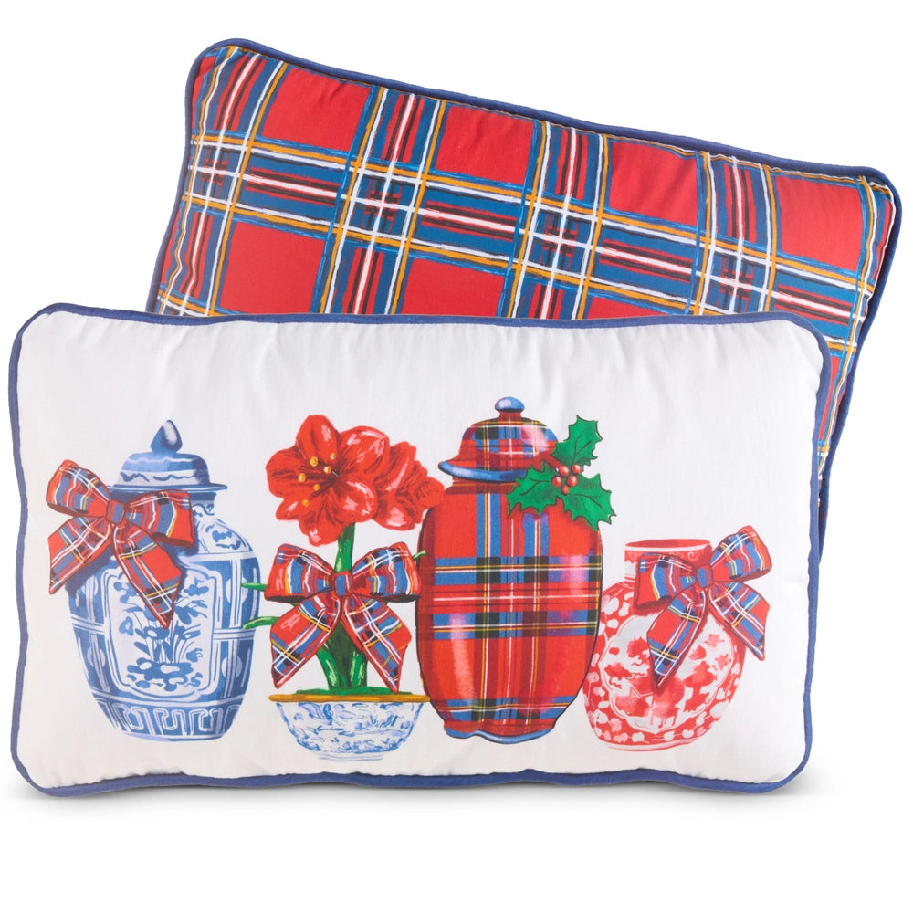 Decorative pillow with plaid pattern and festive design on a white background