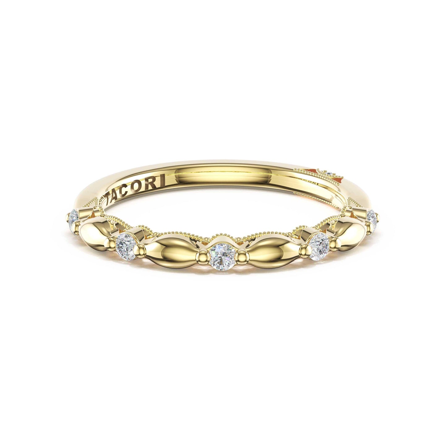 A gold wedding band ring by Jacori, featuring a decorative beaded border with small clear round-cut diamonds, shown on a plain white background.