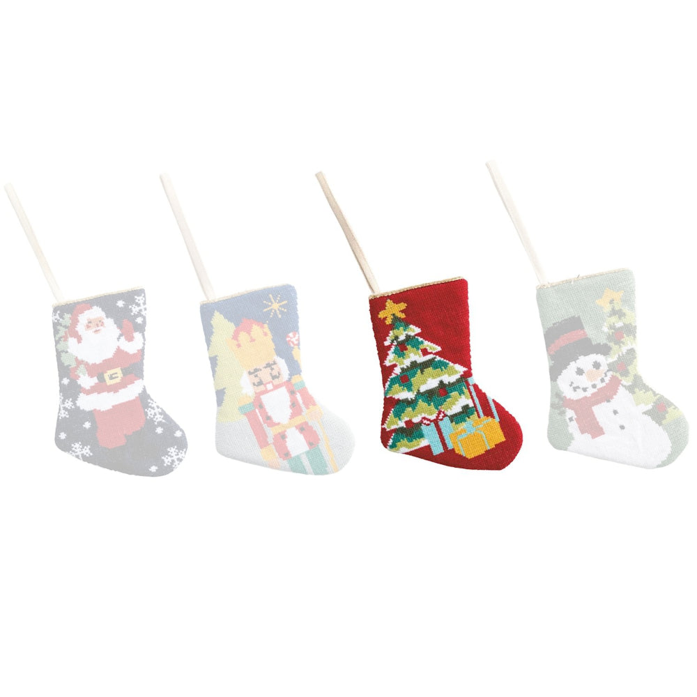 Set of four Christmas-themed stockings with Santa, Nutcracker, Christmas tree, and snowman designs on a white background.