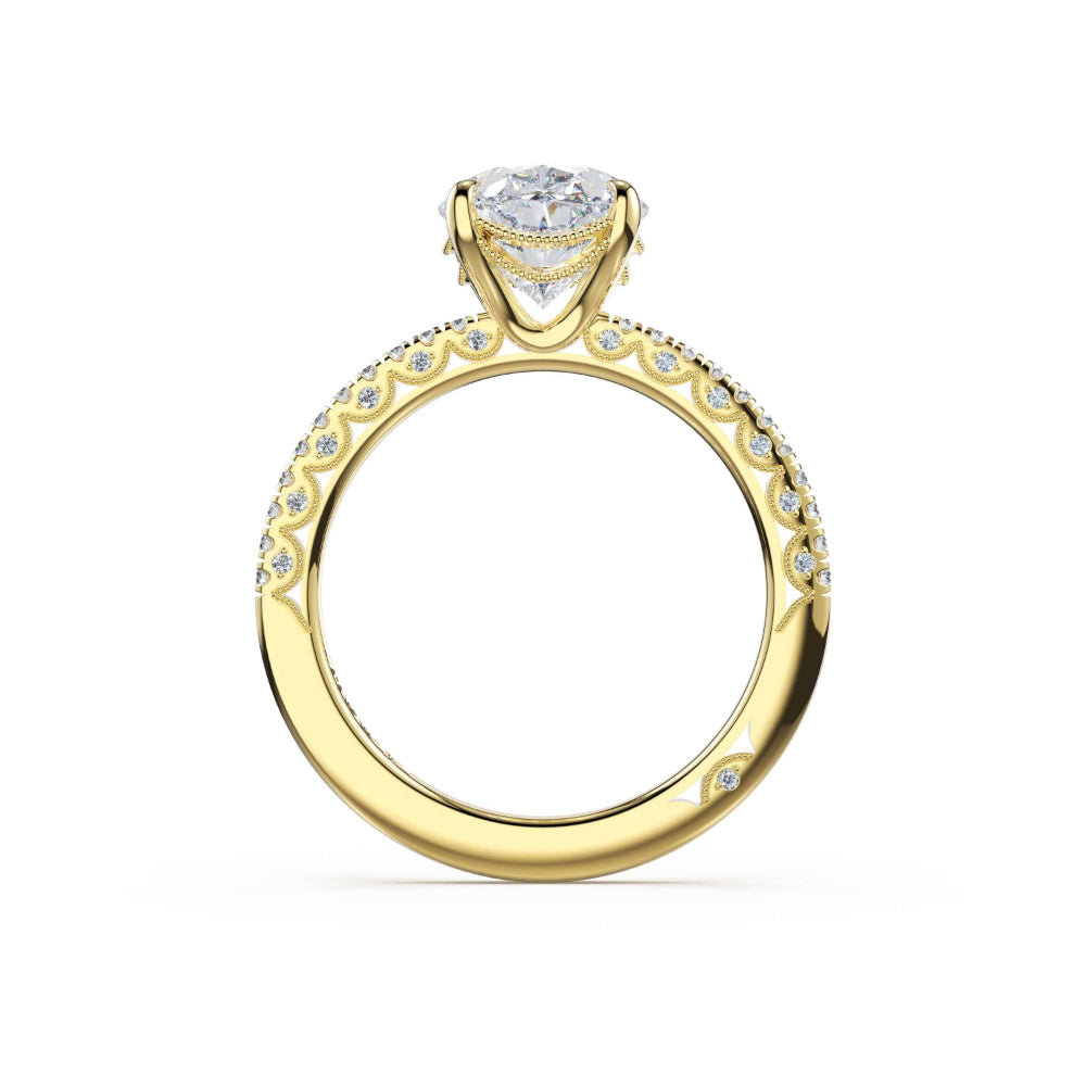 Gold ring with a heart-shaped diamond on a white background