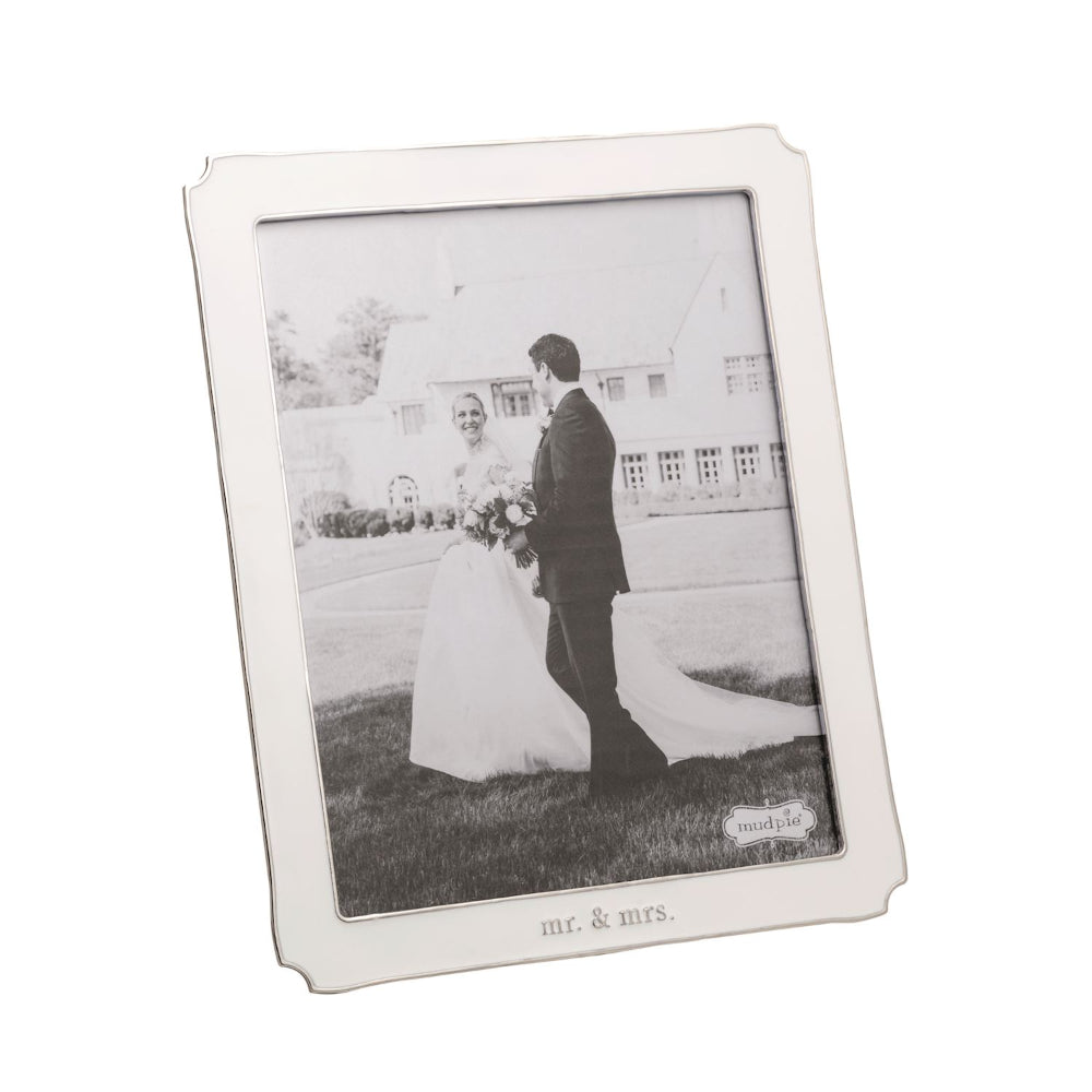 White photo frame with 'mr. & mrs.' text, containing a black and white photo of a couple.