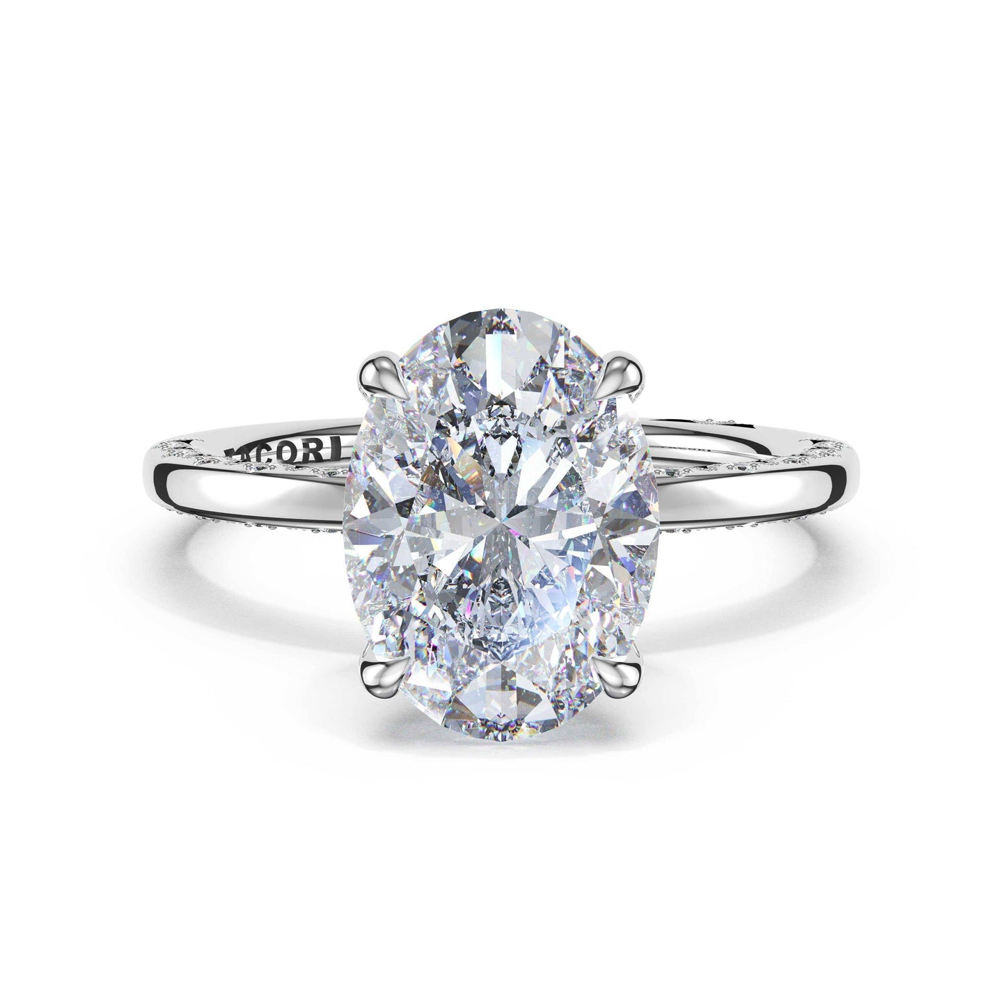 A silver-toned solitaire engagement ring featuring a large oval-cut clear gemstone in a prong setting, with a polished band, shown on a white background from the front