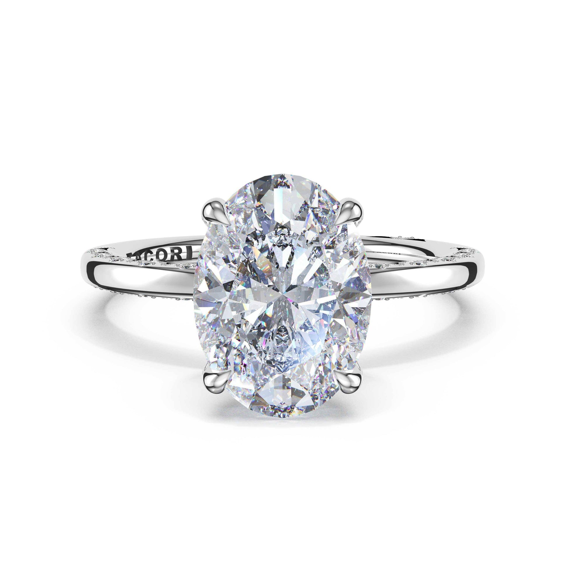 A silver-toned solitaire engagement ring featuring a large oval-cut clear gemstone in a prong setting, with a polished band, shown on a white background from the front