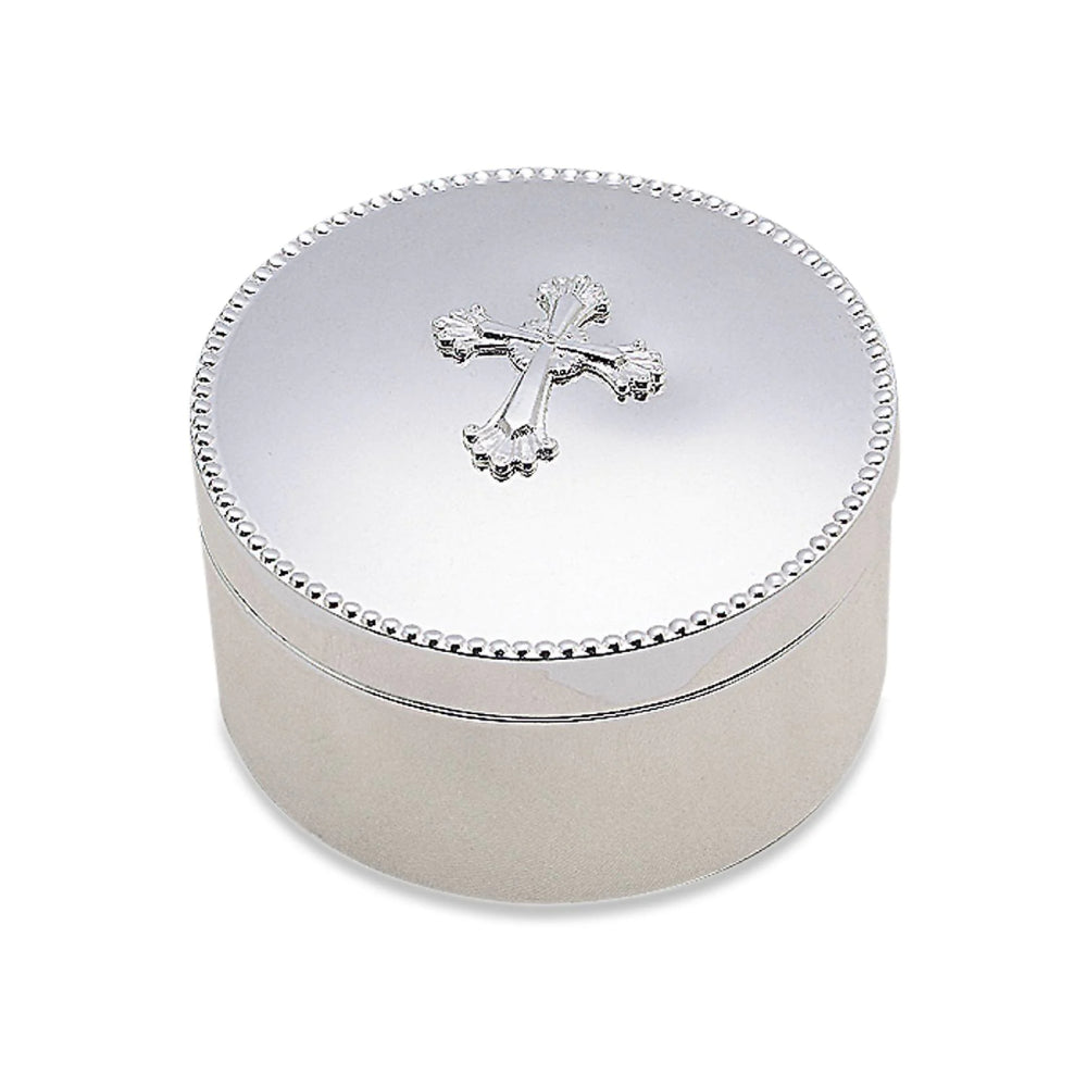 Silver round box with a cross emblem on the top with a beaded edge on a white background.