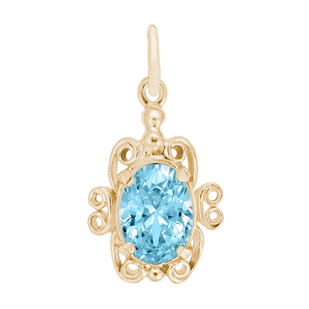 Gold pendant with a blue gemstone on a white background