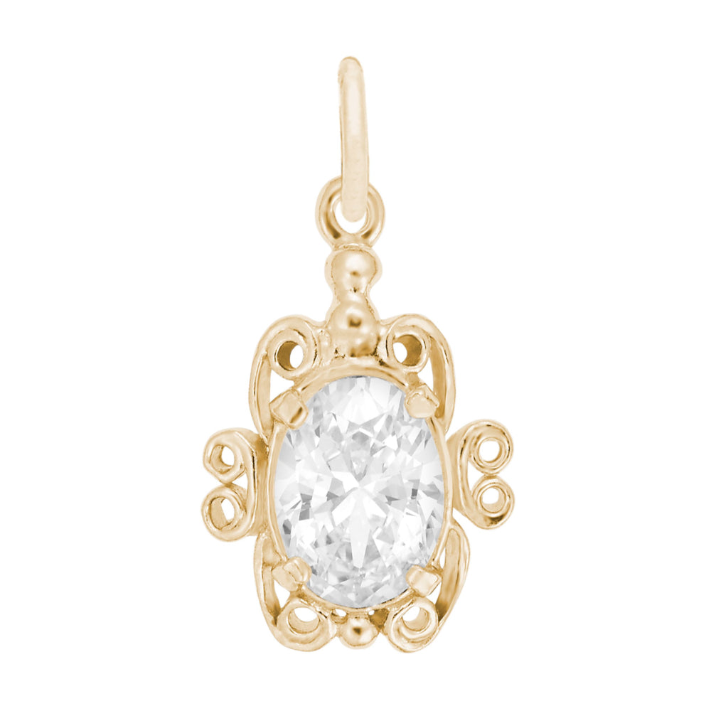 Gold pendant with a clear gemstone on a white background